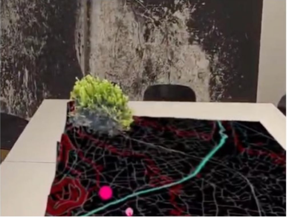 Headset view of the XR environment over a table map